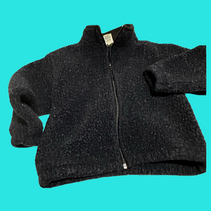 Fuzzy jacket, with zip front, 2 side pockets. Size 5/6